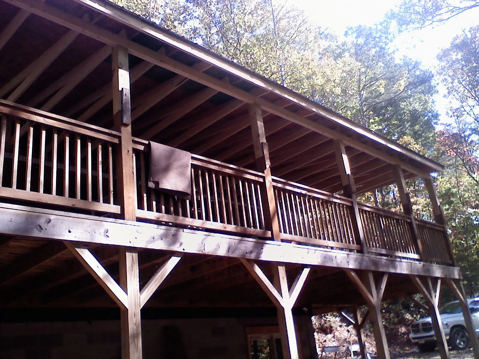 Timber framing under a new elevated porch and deck — Roof Leak Repair in Plain City by Roofing Brothers